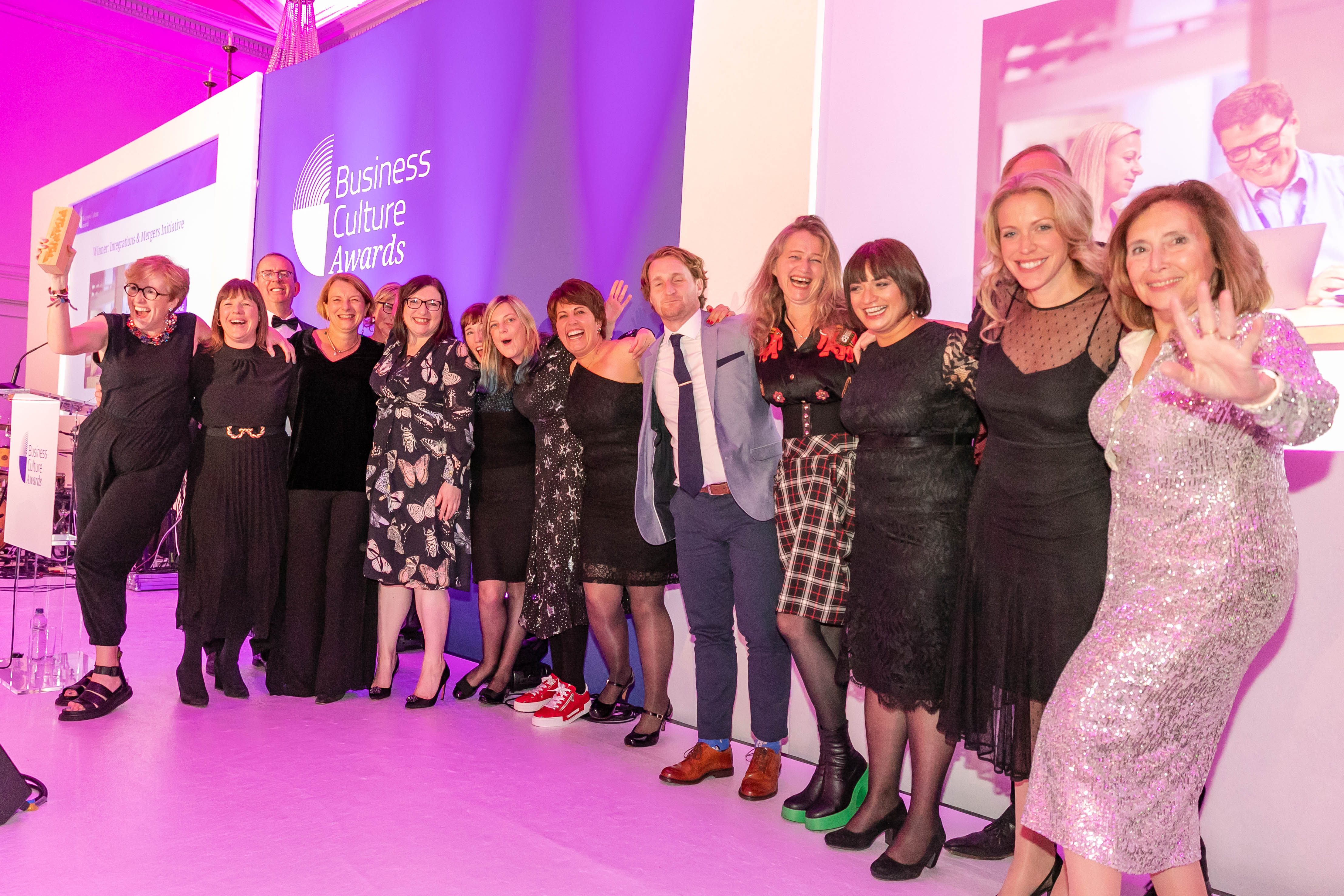 Cambridge colleagues accepting our 2022 Business Culture Award