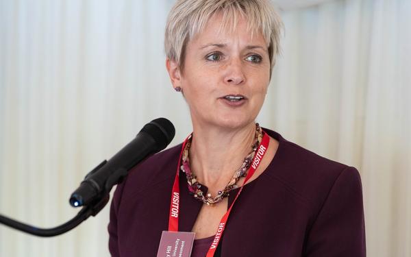 Mandy Hill at lectern at reception in parliament 9 Sept 2025