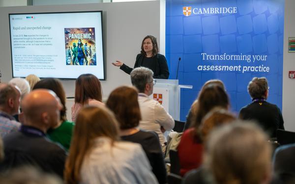 Woman presenting at conference