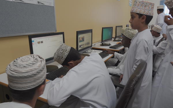 Omani children study on computers
