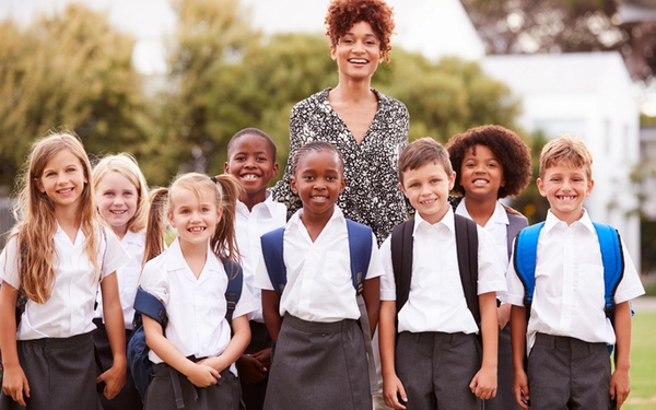 Teacher with students outdoors