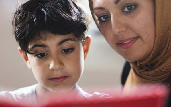 Mother and son read