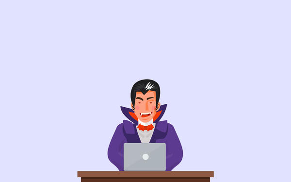 An illustration of a vampire working at a laptop.