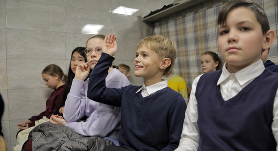 Children study in bomb shelter