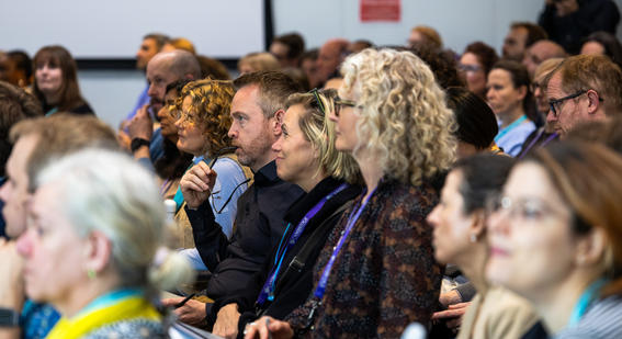 audience in rows at event