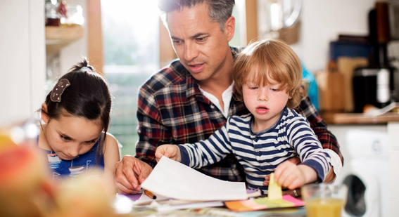 Dad with two young children