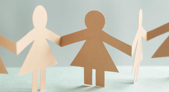 a chain of paper dolls