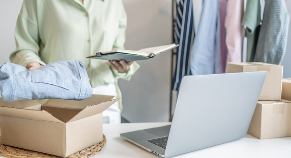 Small Business Owner Packing cardboard box